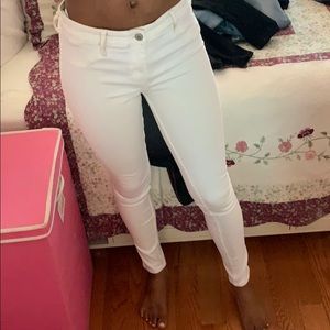 Low rise white skinny jeans